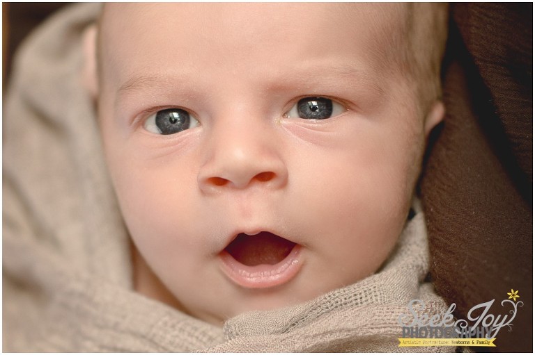 newborn with eyes open